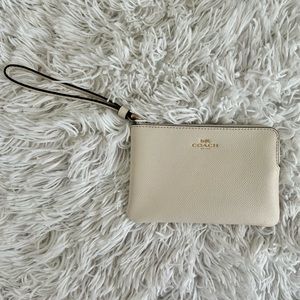 Coach corner zip wristlet- cream